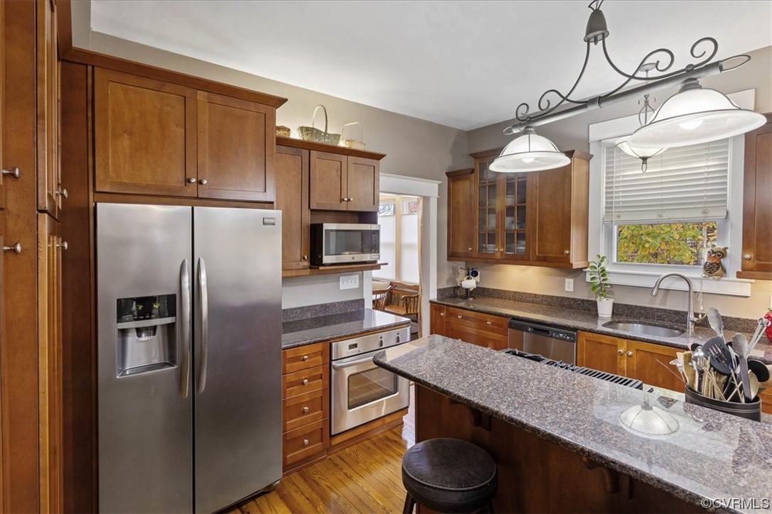 708 Hamilton Avenue Colonial Heights, VA 23834 - Photo 13 of 32 a kitchen with a refrigerator and a sink