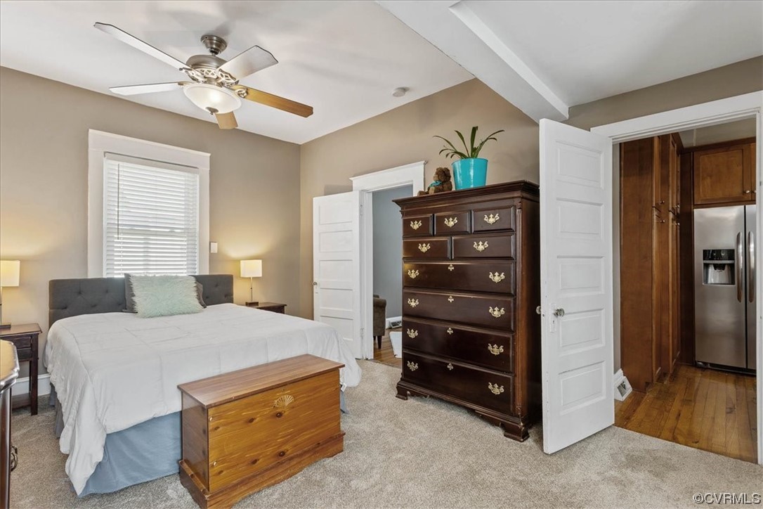 708 Hamilton Avenue Colonial Heights, VA 23834 - Photo 17 of 32 a bedroom with a bed and a chandelier