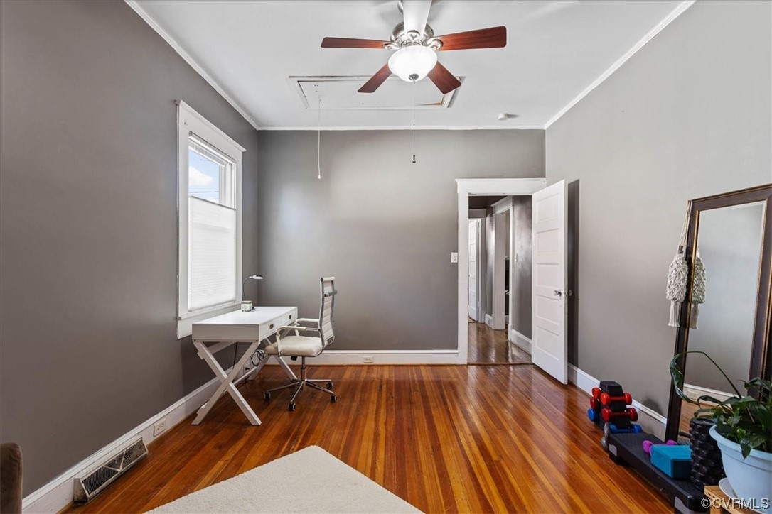 708 Hamilton Avenue Colonial Heights, VA 23834 - Photo 21 of 32 a room with wooden floor and windows