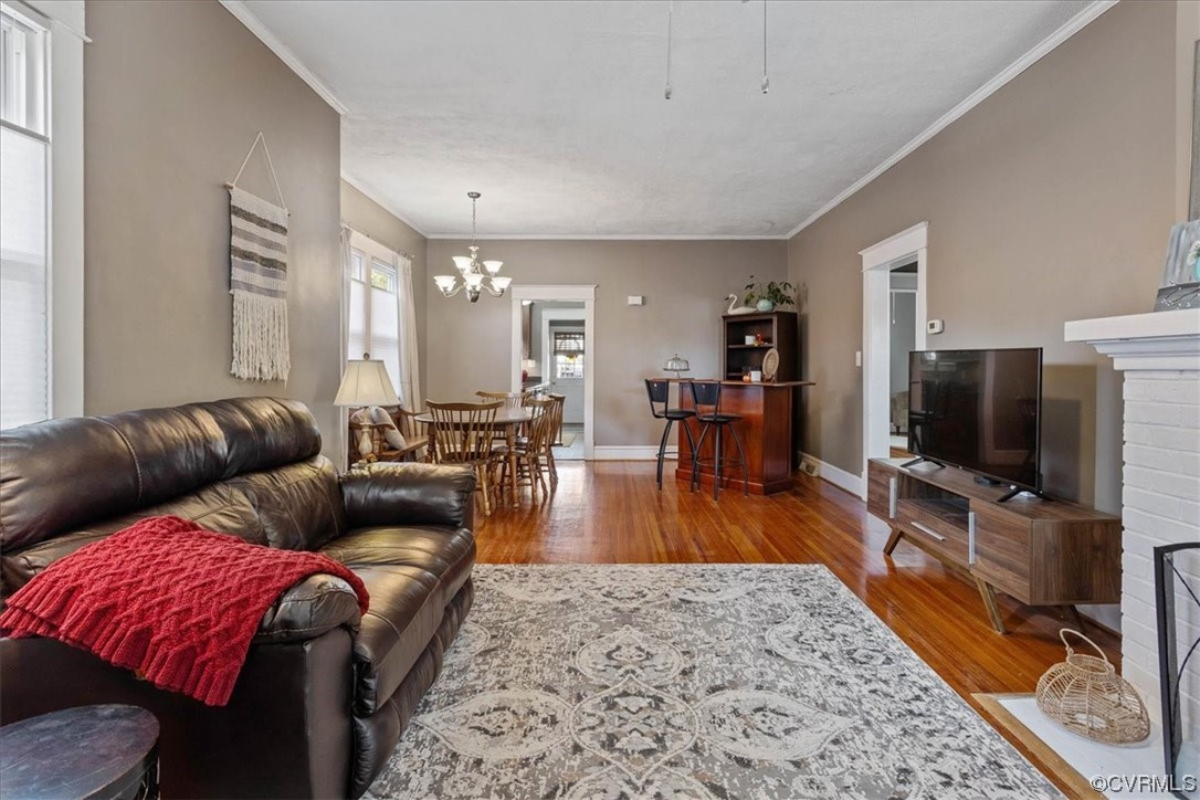 708 Hamilton Avenue Colonial Heights, VA 23834 - Photo 5 of 32 a living room with furniture and a flat screen tv