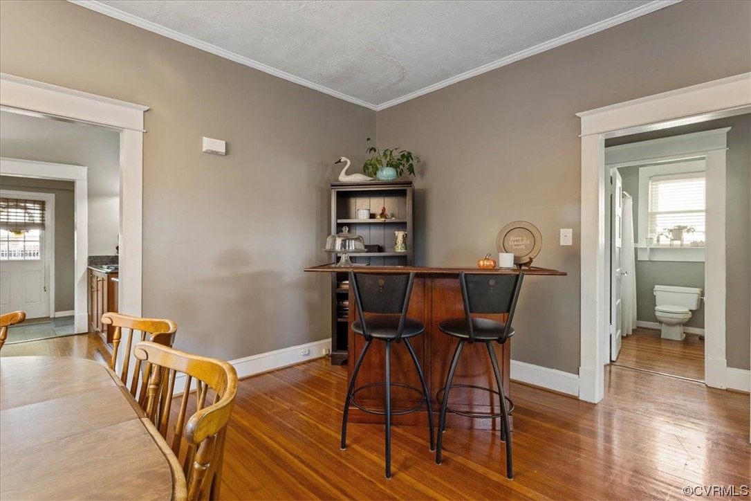 708 Hamilton Avenue Colonial Heights, VA 23834 - Photo 8 of 32 a view of a dining room with furniture and wooden floor