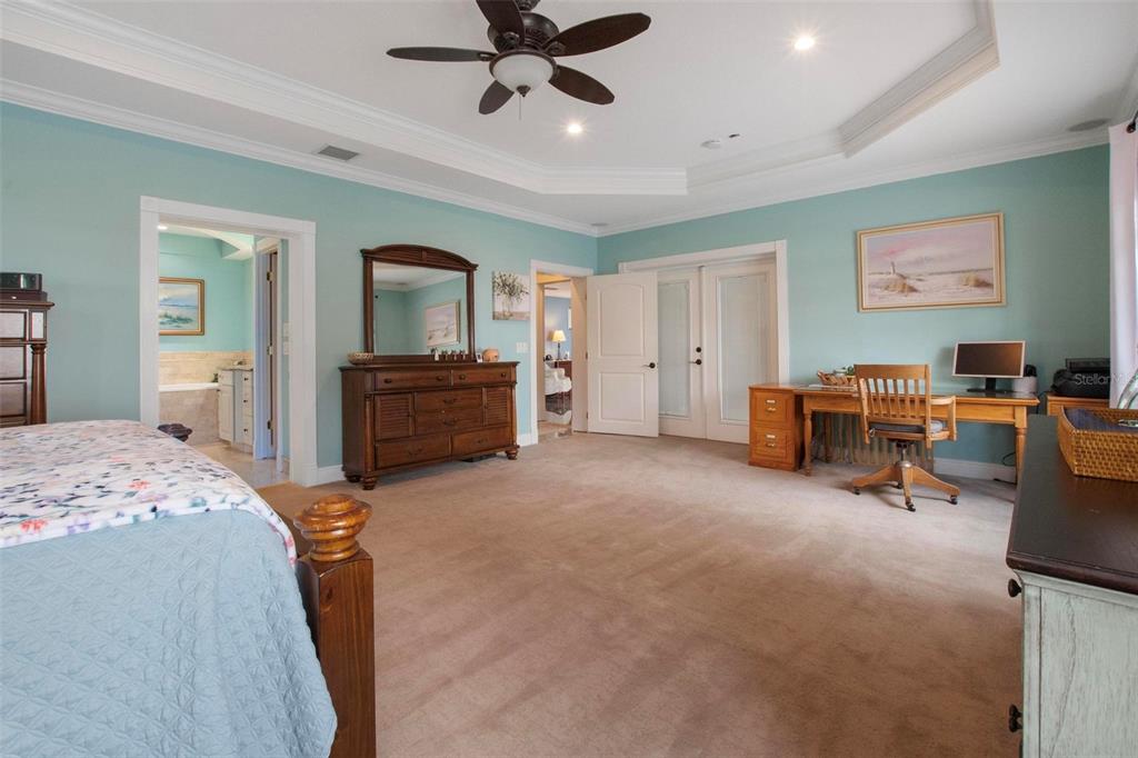 250 Brigham Road Northwest Winter Haven, FL 33881 - Photo 32 of 65 a bed room with a bed and furniture