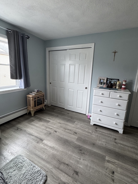 358 Broadway, Unit 13 Lynn, MA 01904 - Photo 24 of 26 a view of room with window and dresser