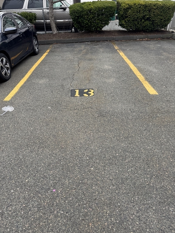 358 Broadway, Unit 13 Lynn, MA 01904 - Photo 26 of 26 a view of outdoor space with parking