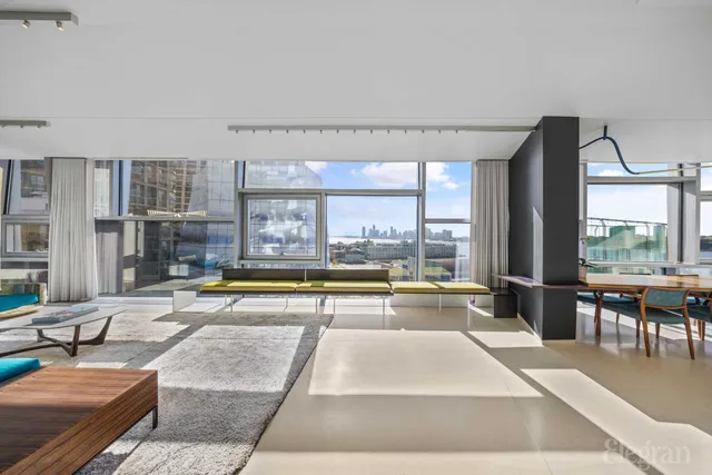 a view of swimming pool with outdoor seating