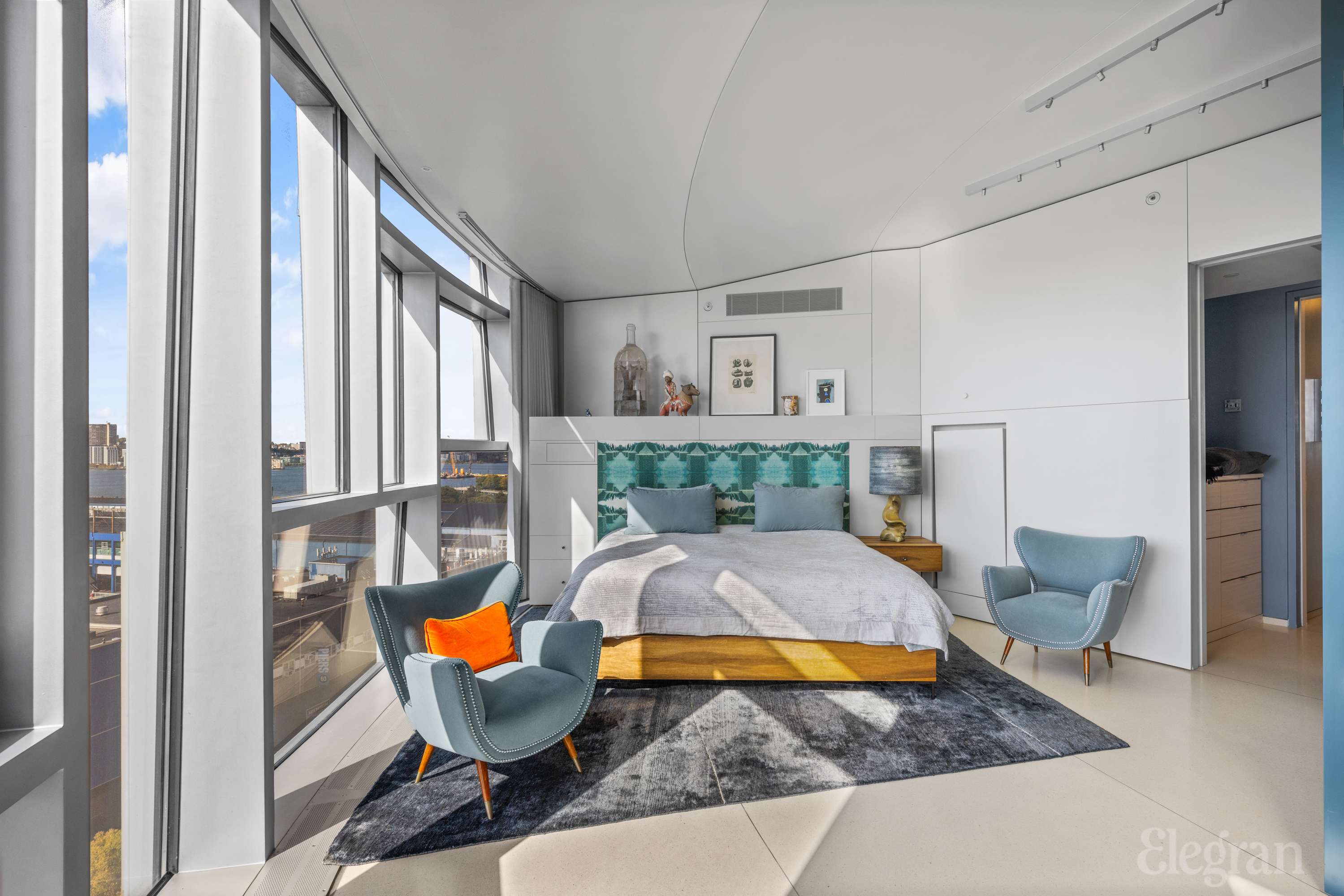 100 11th Avenue, Unit 11B Manhattan, NY 10011 - Photo 10 of 19 a living room with furniture and a fireplace