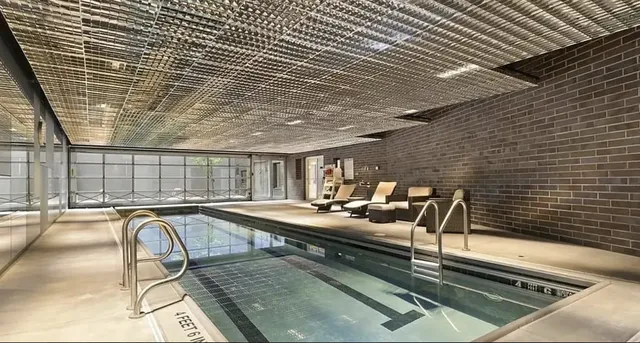 swimming pool with outdoor seating