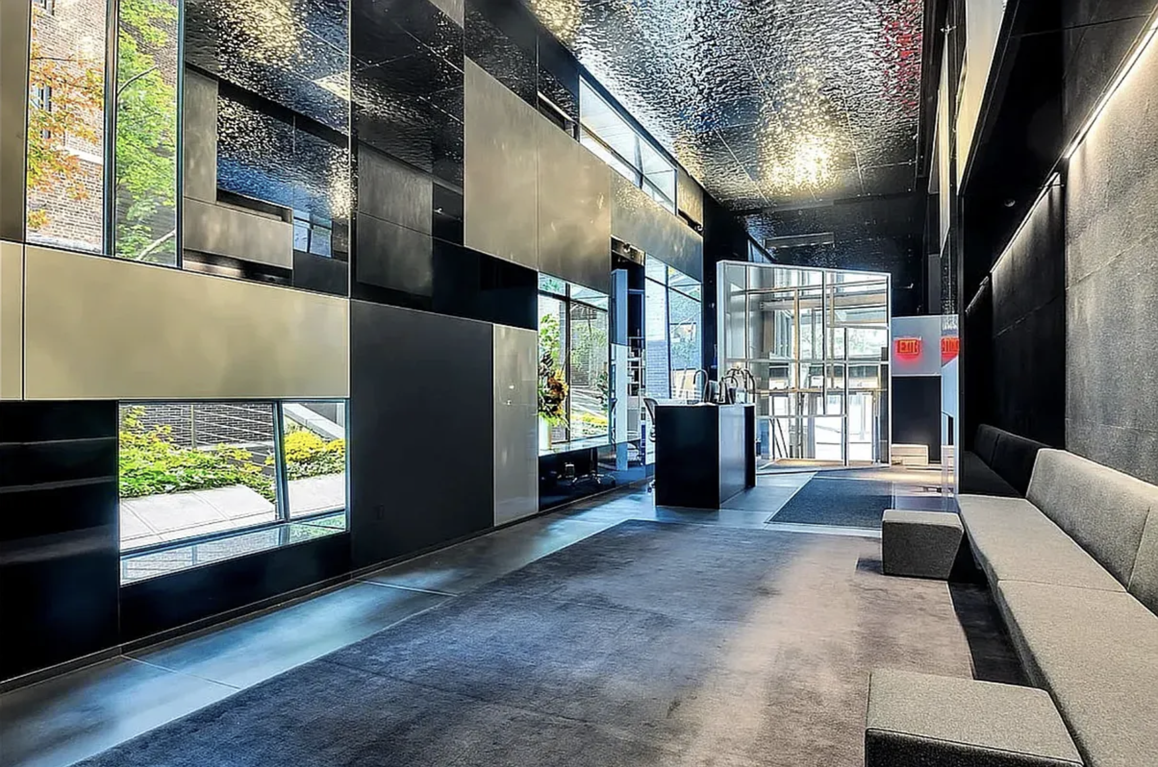 100 11th Avenue, Unit 11B Manhattan, NY 10011 - Photo 16 of 19 a view of a living room with furniture and a fireplace
