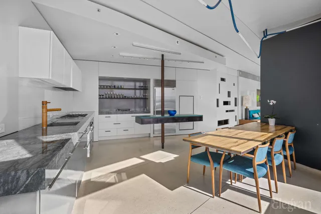 a room with lots of table and chairs