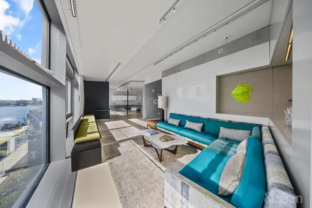 a kitchen that has a table and chairs in it