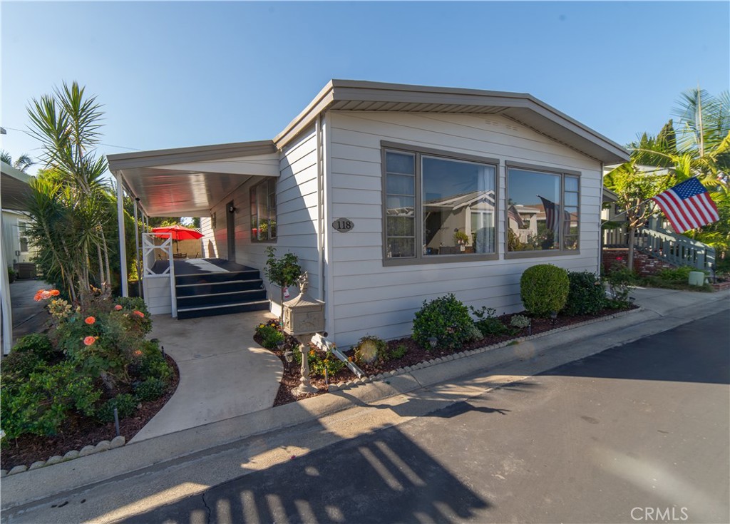 118 Estrella Tustin, CA 92780 - Photo 1 of 1 a front view of a house with a porch