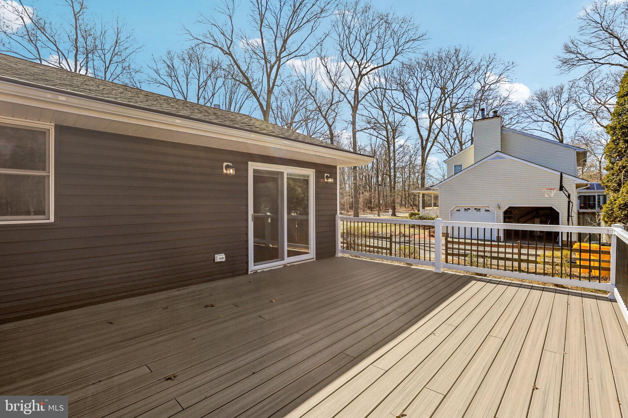 306 Christy Road Pasadena, MD 21122 - Photo 39 of 58 Spacious deck with serene wooded views.