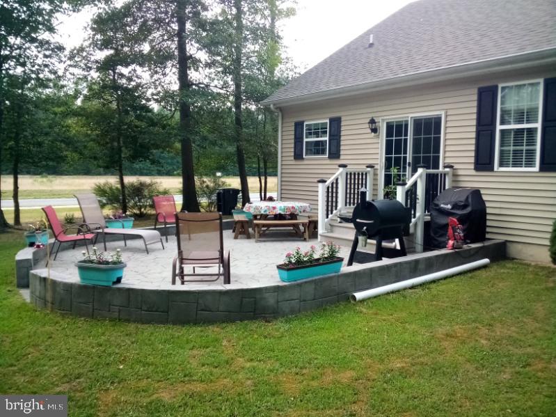24712 Draper Loop Georgetown, DE 19947 - Photo 12 of 45 back yard patio
