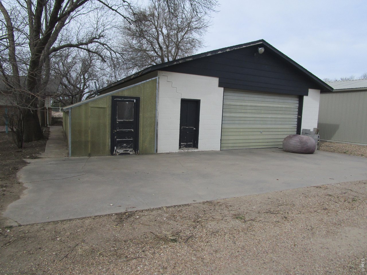 830 15th Street Burlington, CO 80807 - Photo 4 of 21 a view of a house with a yard