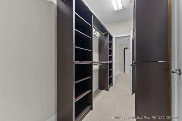 a view of a house with a fence