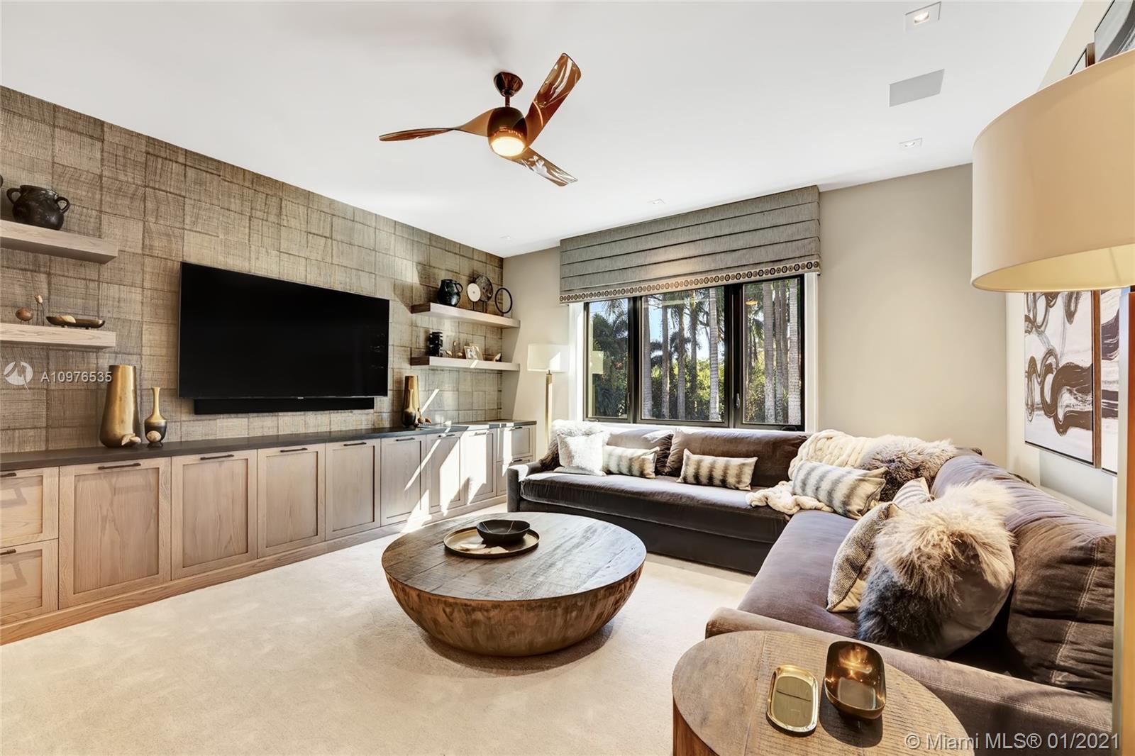 13900 Luray Road Southwest Ranches, FL 33330 - Photo 23 of 50 a living room with furniture and a flat screen tv