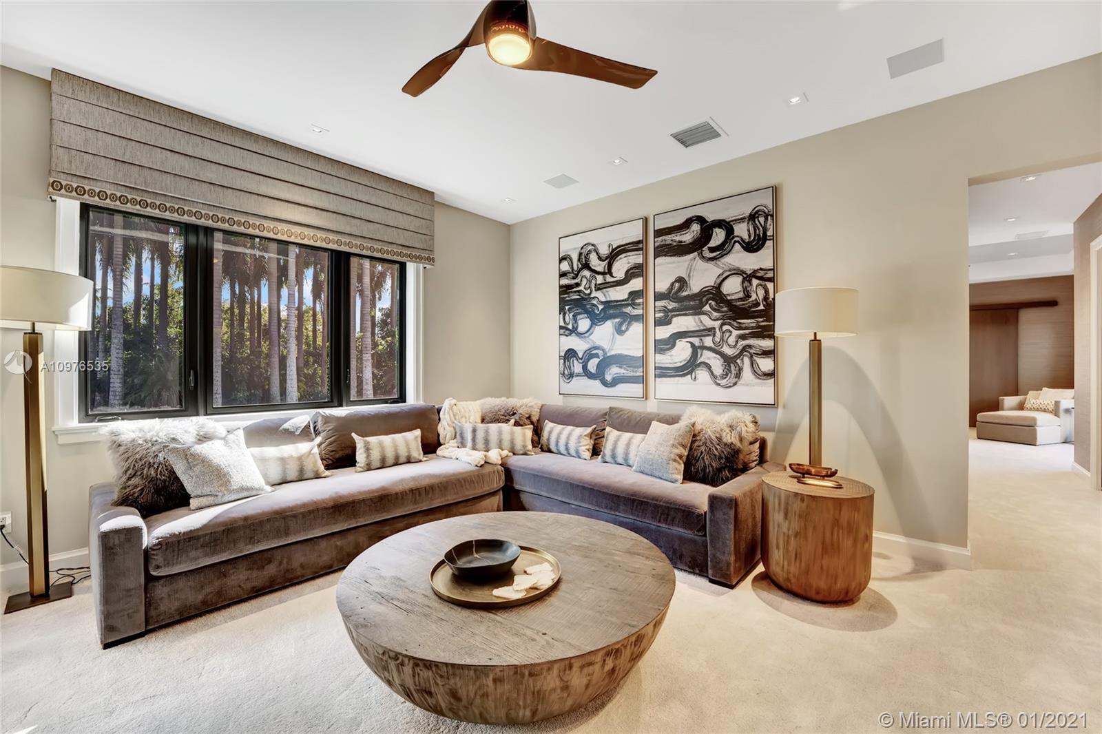 13900 Luray Road Southwest Ranches, FL 33330 - Photo 24 of 50 a living room with furniture and a large window