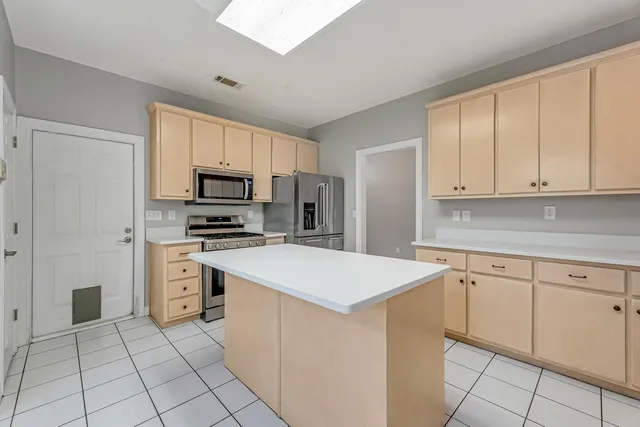 a white bath tub sitting next to a window