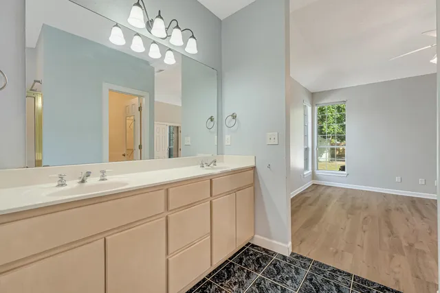 a front view of a house with swimming pool having outdoor seating