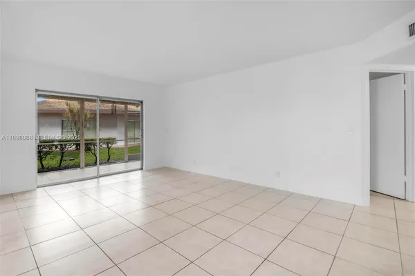 a large kitchen with cabinets