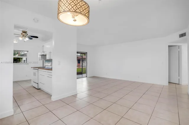 a view of cabinets and window