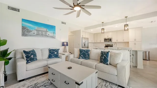 a bedroom with a bed and a television