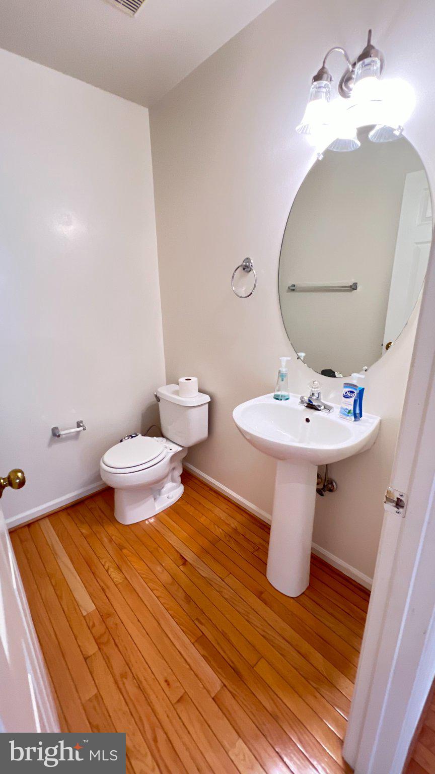 4100 Flower Fairfax, VA 22030 - Photo 37 of 47 a bathroom with a sink toilet and a mirror