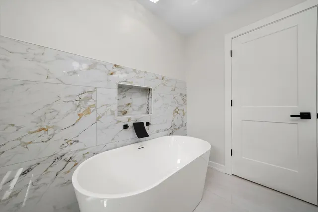 a bathroom with a bathtub