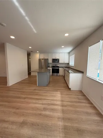 a view of kitchen and windows