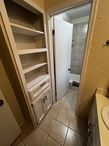 a bathroom with a sink and toilet
