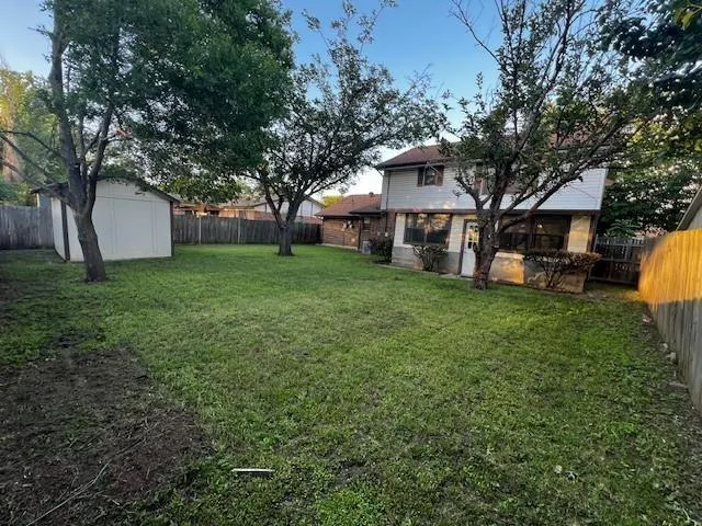 a view of a yard in front of house