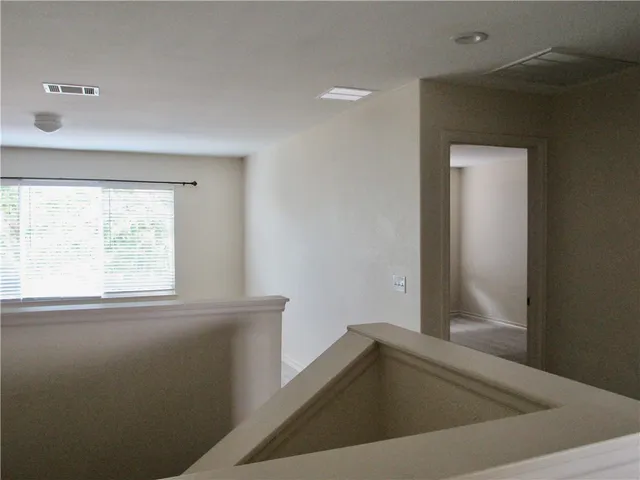 a view of a bathtub in a room