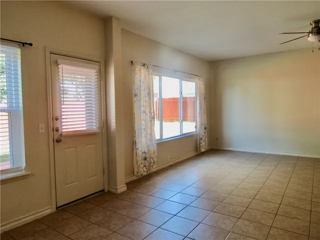 an empty room with windows