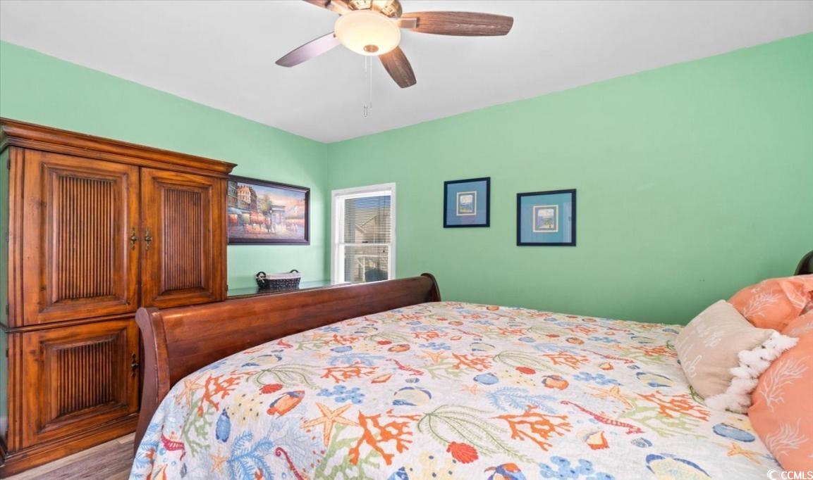 154 SandDollar Drive Holden Beach, NC 28462 - Photo 16 of 39 Bedroom featuring ceiling fan