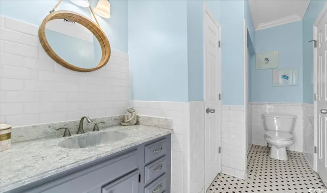 $879,900 | 154 SandDollar Drive, Holden Beach, NC 28462