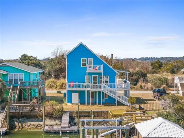 $879,900 | 154 SandDollar Drive, Holden Beach, NC 28462