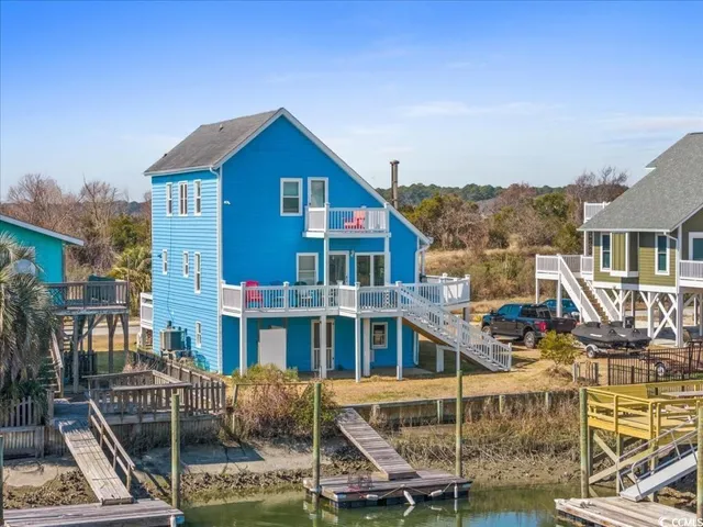 $879,900 | 154 SandDollar Drive, Holden Beach, NC 28462