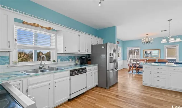 $879,900 | 154 SandDollar Drive, Holden Beach, NC 28462