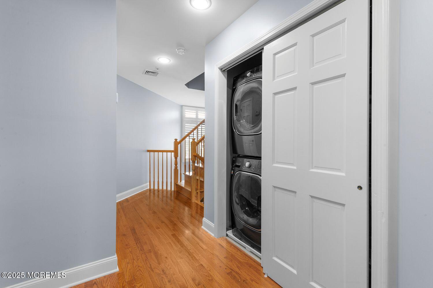 A162 Main Street Manasquan, NJ 08736 - Photo 22 of 41 a view of a hallway with washer and dryer