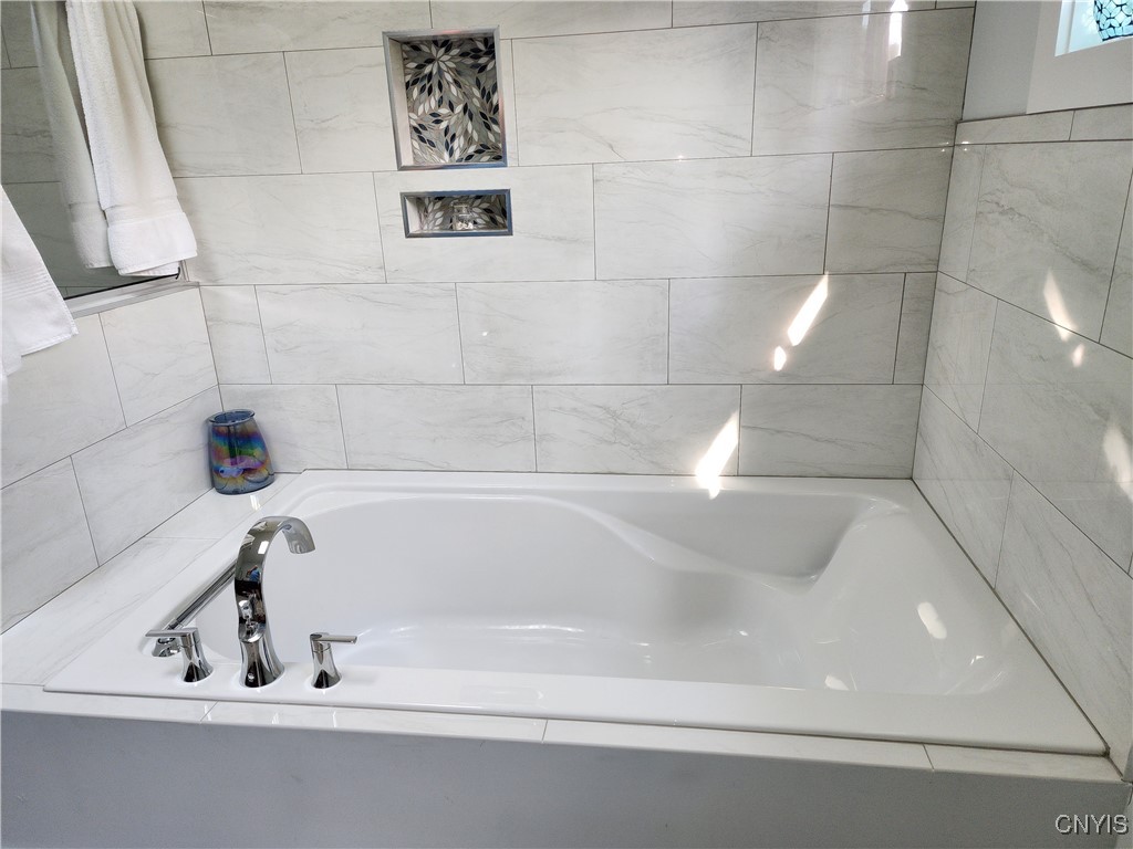 9390 Fox Road Watertown, NY 13601 - Photo 7 of 25 primary suite tub