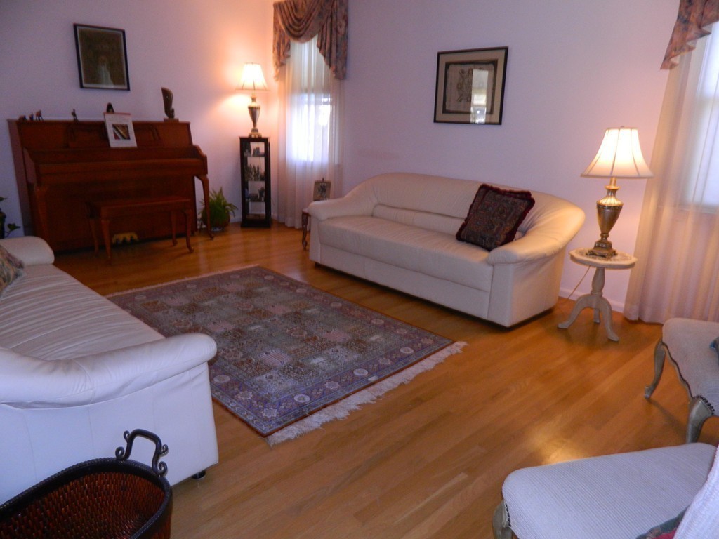 2 Copley Place Canton, MA 02021 - Photo 13 of 28 a living room with furniture and a lamp