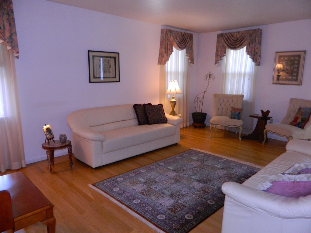 2 Copley Place Canton, MA 02021 - Photo 14 of 28 a living room with furniture and a rug