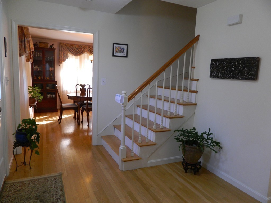 2 Copley Place Canton, MA 02021 - Photo 15 of 28 a view of entryway and hall with wooden floor