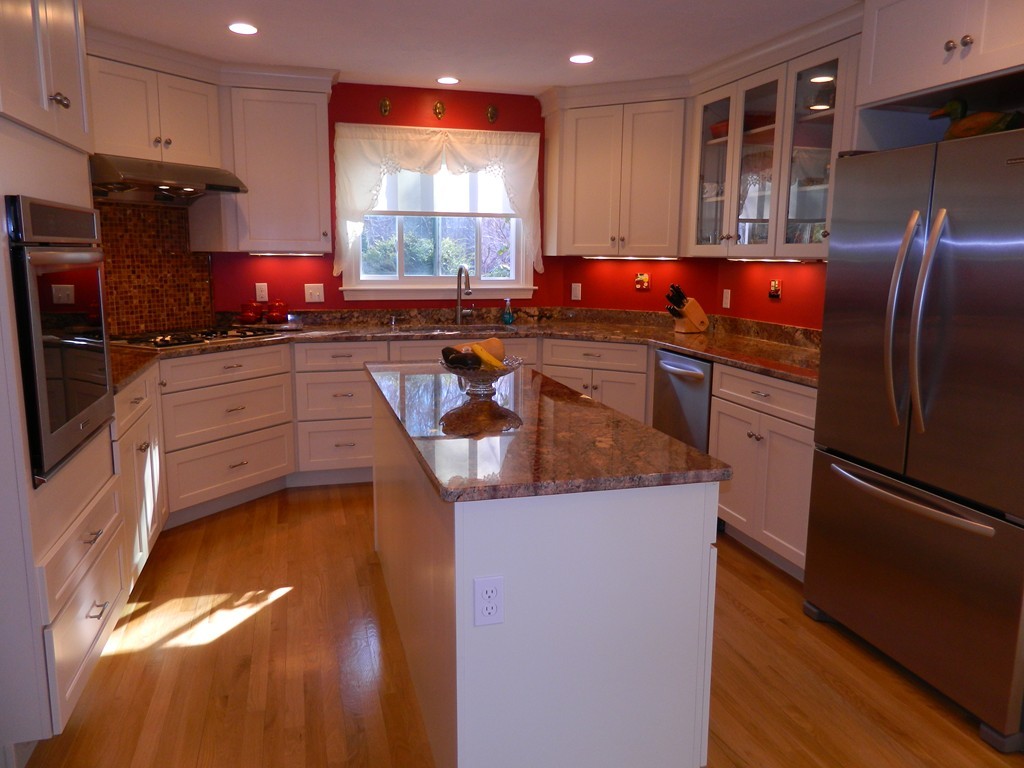 2 Copley Place Canton, MA 02021 - Photo 3 of 28 a kitchen with stainless steel appliances granite countertop a sink a stove and a refrigerator