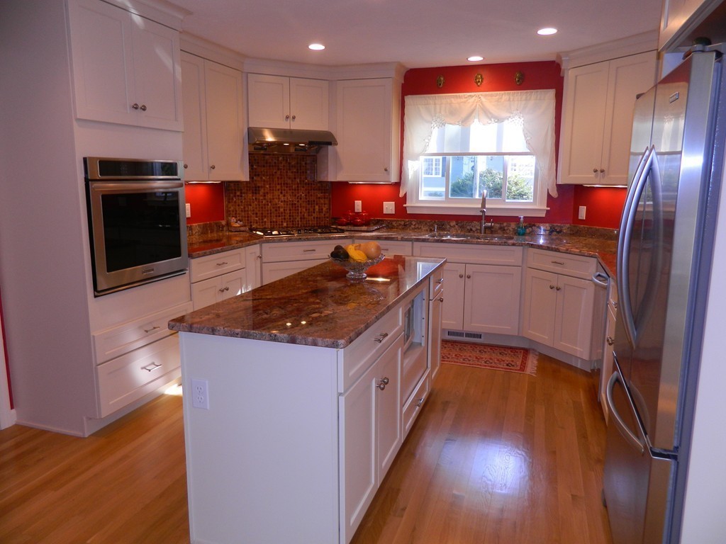 2 Copley Place Canton, MA 02021 - Photo 5 of 28 a kitchen with stainless steel appliances granite countertop sink stove top oven and cabinets