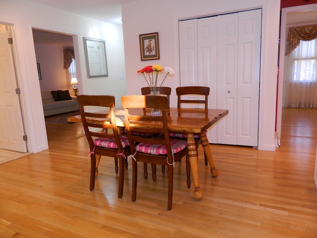 2 Copley Place Canton, MA 02021 - Photo 8 of 28 a view of a dining room with furniture and wooden floor