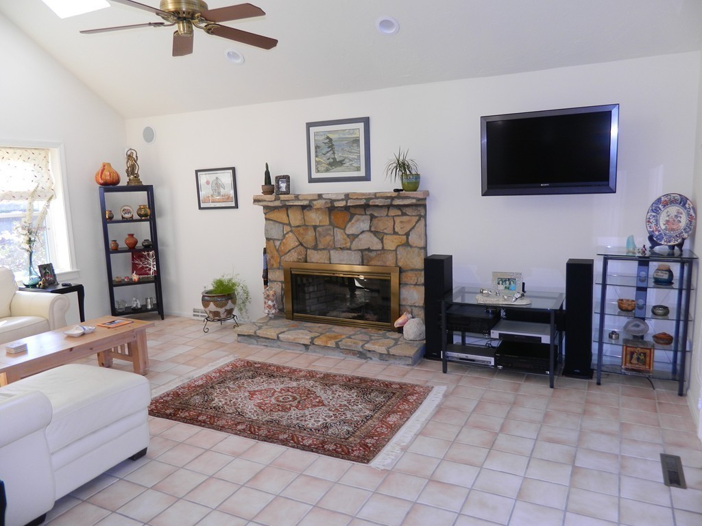 2 Copley Place Canton, MA 02021 - Photo 9 of 28 a living room with furniture and a flat screen tv