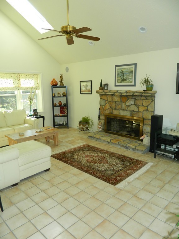 2 Copley Place Canton, MA 02021 - Photo 10 of 28 a living room with fireplace furniture and a fireplace