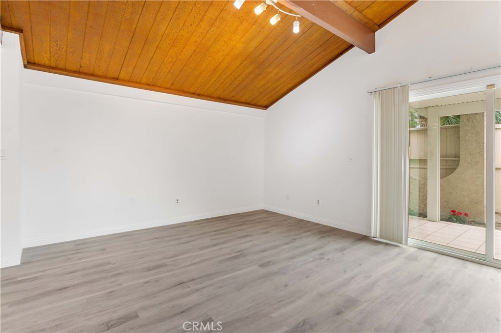 1428 Fredricks Lane Upland, CA 91786 - Photo 11 of 29 an empty room with wooden floor