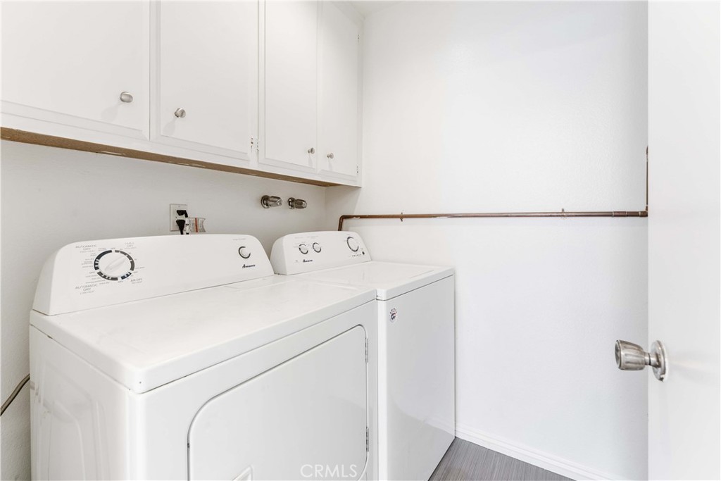 1428 Fredricks Lane Upland, CA 91786 - Photo 18 of 29 a utility room with dryer and washer